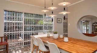 Customer photo of Kitchen Island Pendant Light, 2-Tier Aluminum and Iron Frame with Dual Diffuser Discs, Matte Black and Brushed Metal